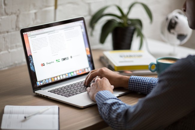 canva-person-using-macbook-pro